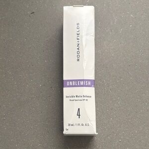 Rodan + Fields Unblemish Gel with White and Purple Packaging